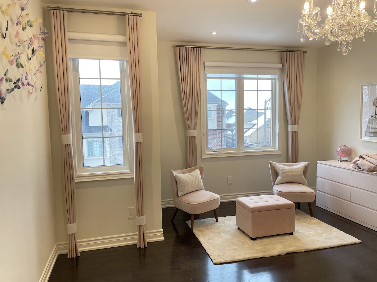 Nursery with blush pink curtains