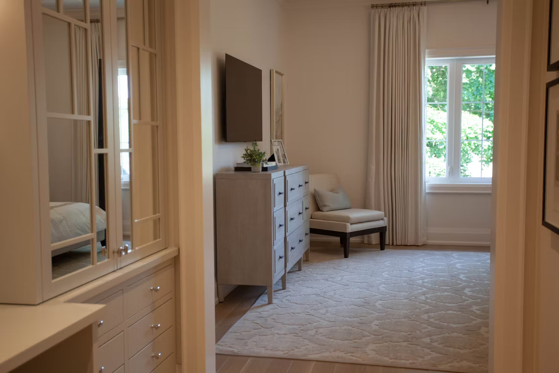 Master suite with refined neutral drapery