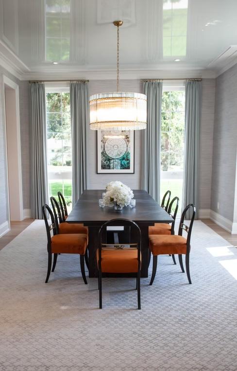 Formal dining room with elegant curtain panels