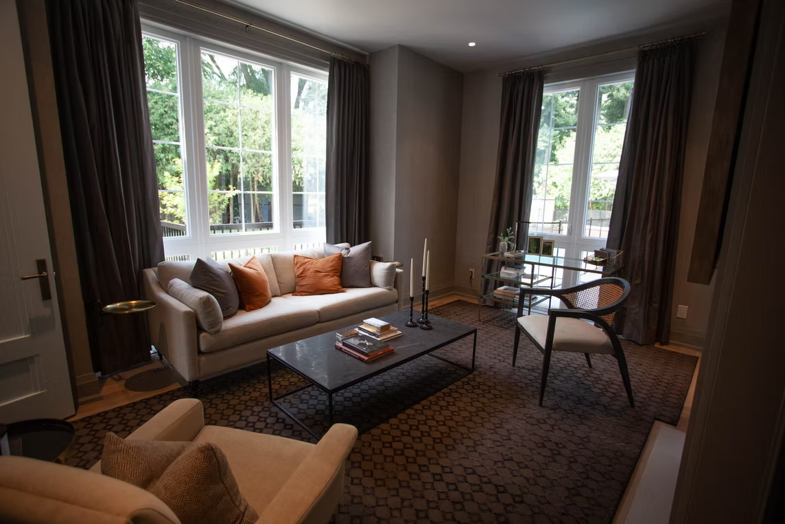 Contemporary study with tailored drapery panels