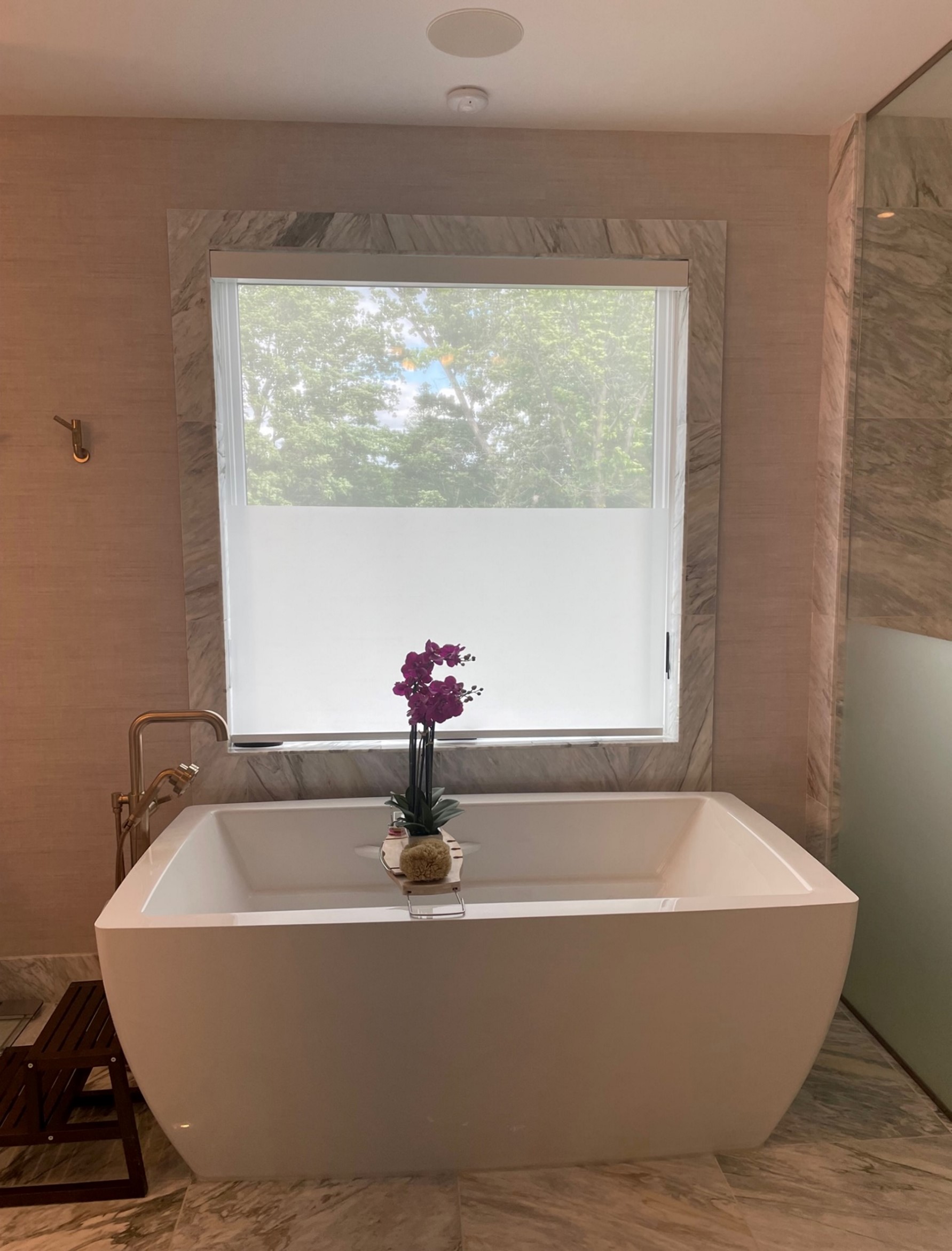 TOPEN shade in luxury marble bathroom with freestanding tub